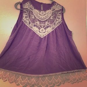 Shirt with lace trim at the bottom and top